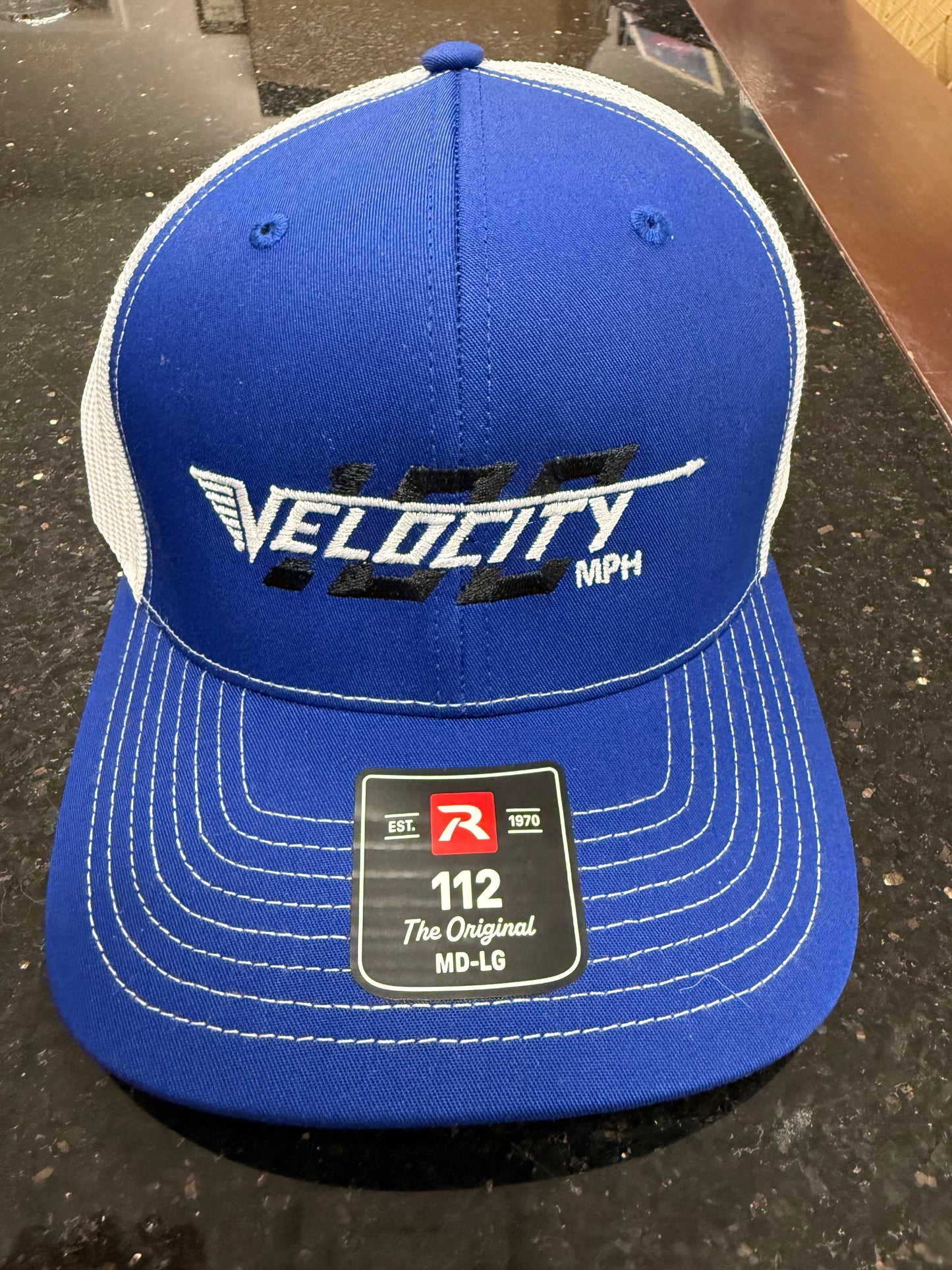 Velocity 100 Red hat with snap back. Trucker-style hat.